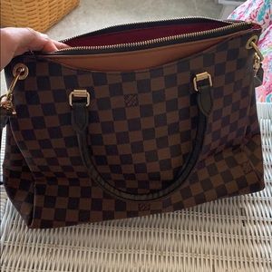 Authentic Louis Vuitton cross body bag